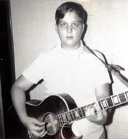 THIS IS MO PLAYING HIS DAD'S 1952 GIBSON ACOUSTIC GUITAR. THIS IS THE GUITAR MO LEARNED HIS FIRST CHORD ON.